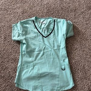 Light blue greys anatomy scrub top with black trim